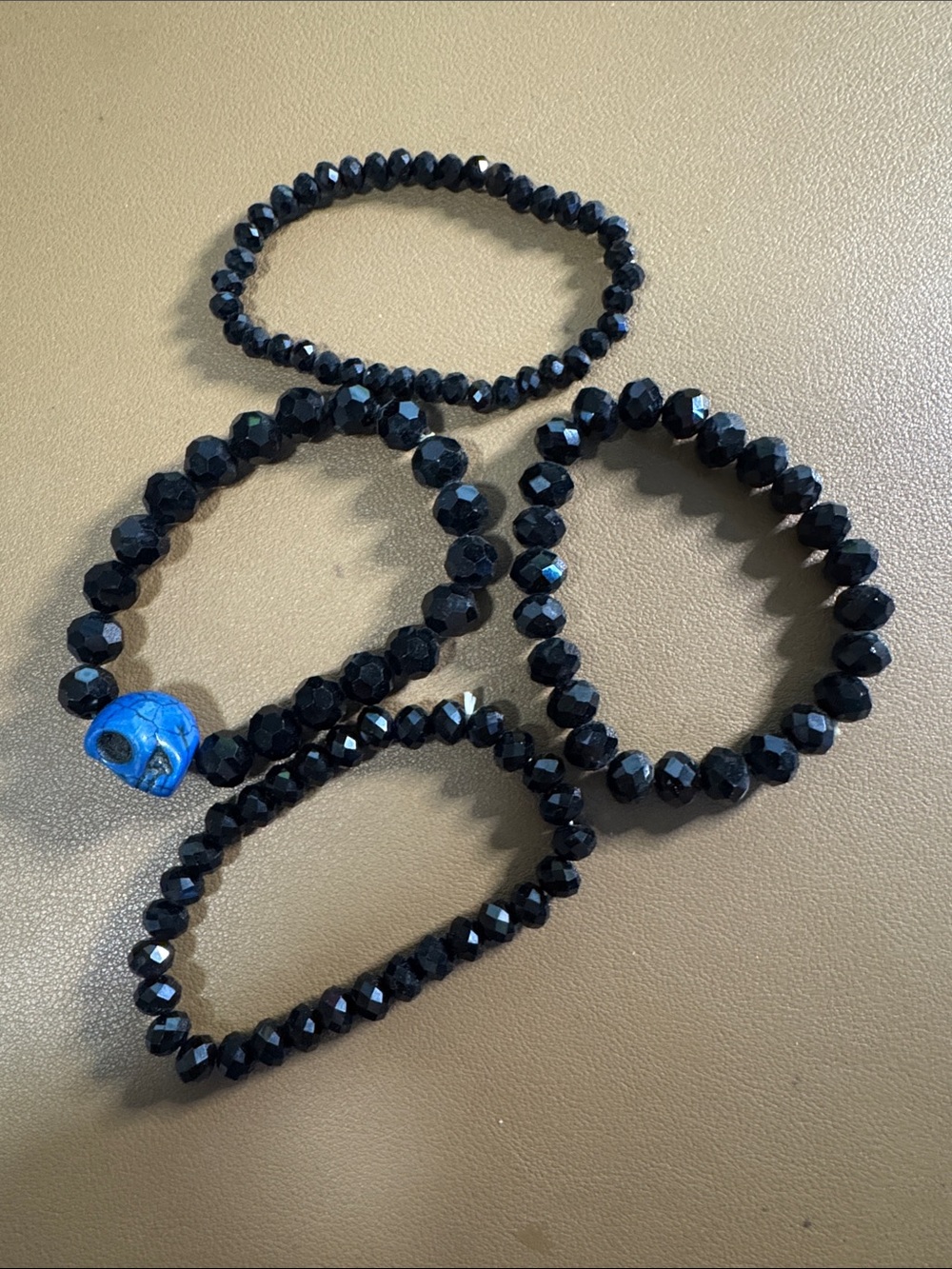 Black Beaded Stretch Bracelet with Blue Skull Accent - Picture 2 of 3